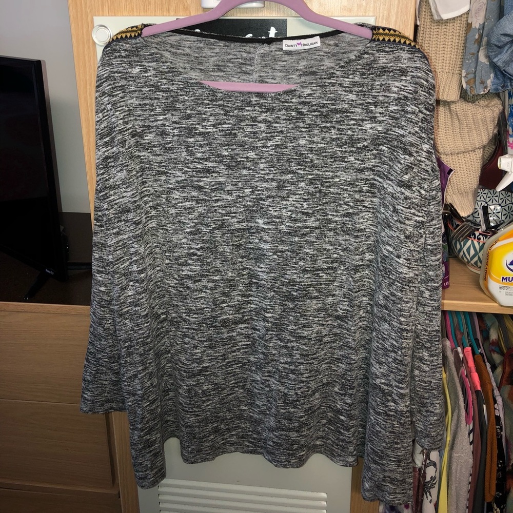super cute sweater with detailing on the side
